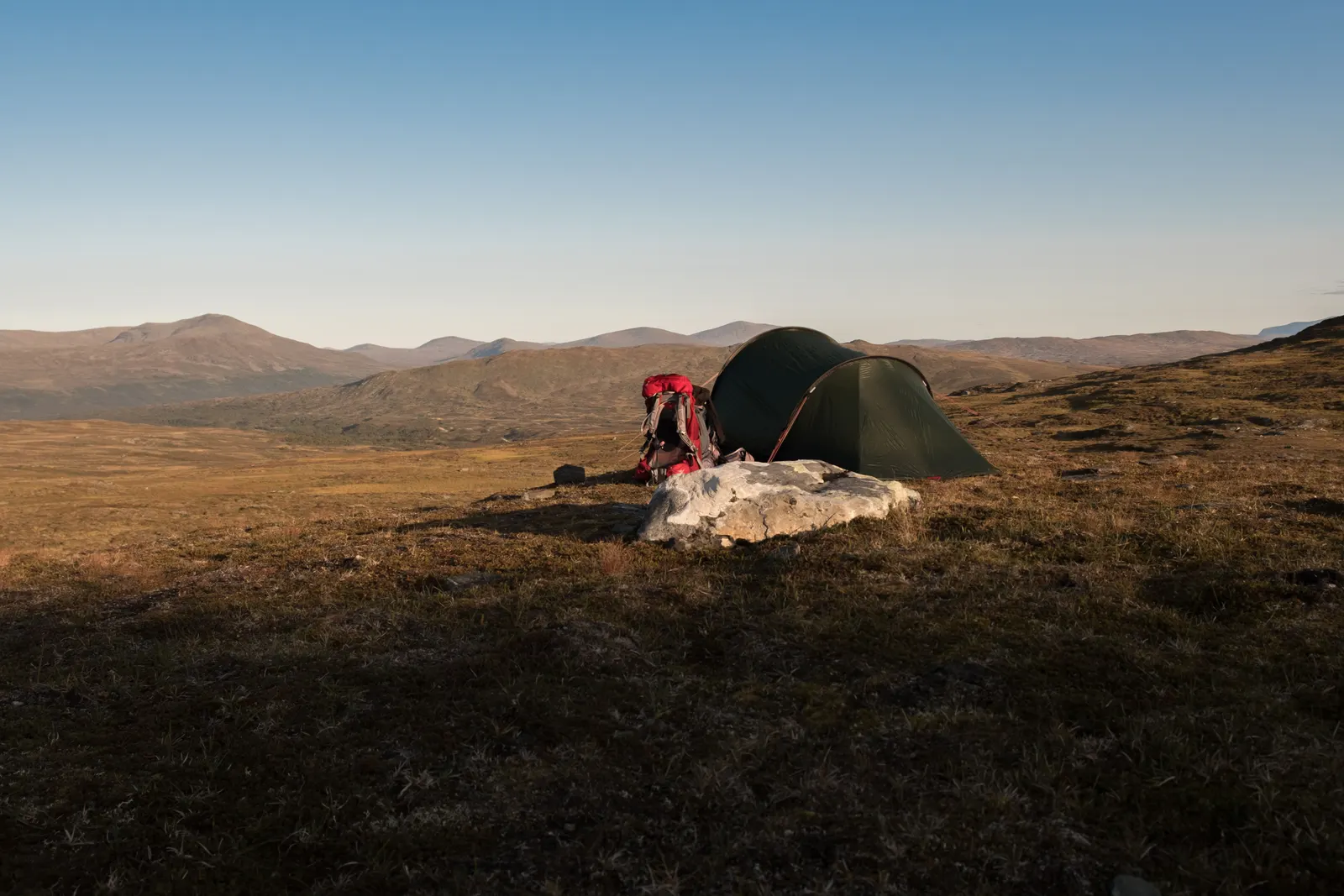 Tents and camping gear set up outdoors